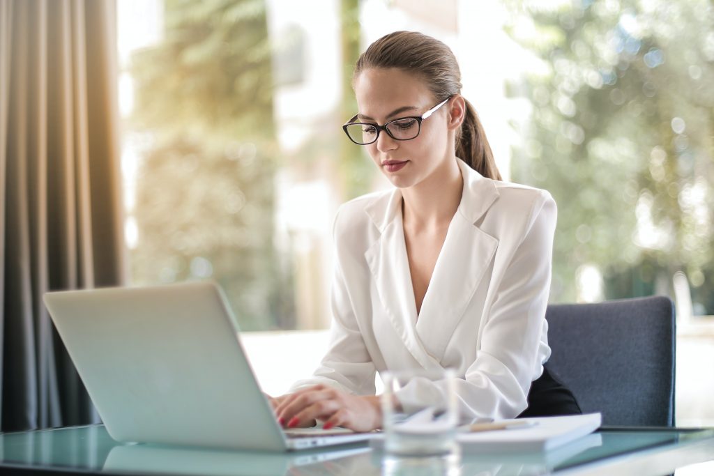 proactive it maintenance plan - woman using laptop